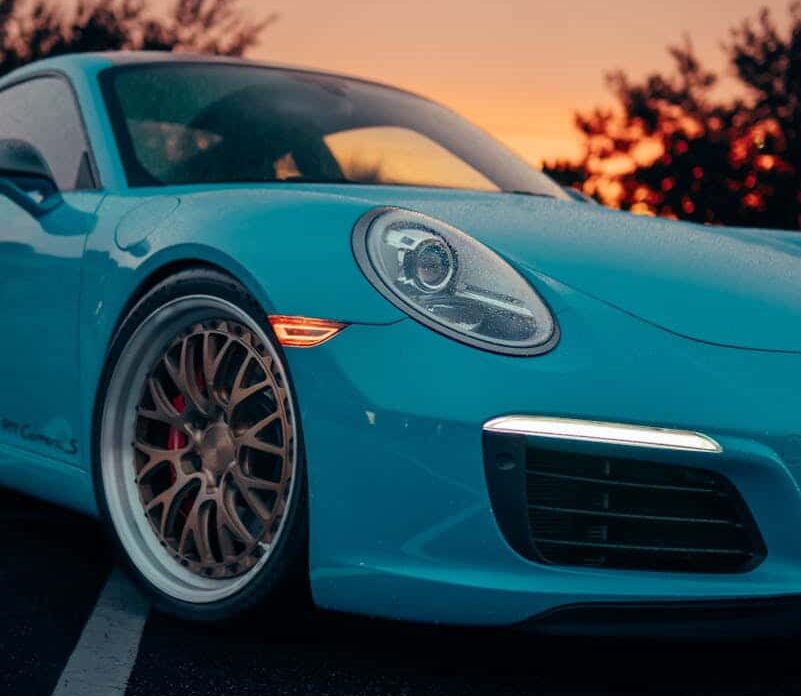 Porsche 911 bleue mode sport en importation Allemagne