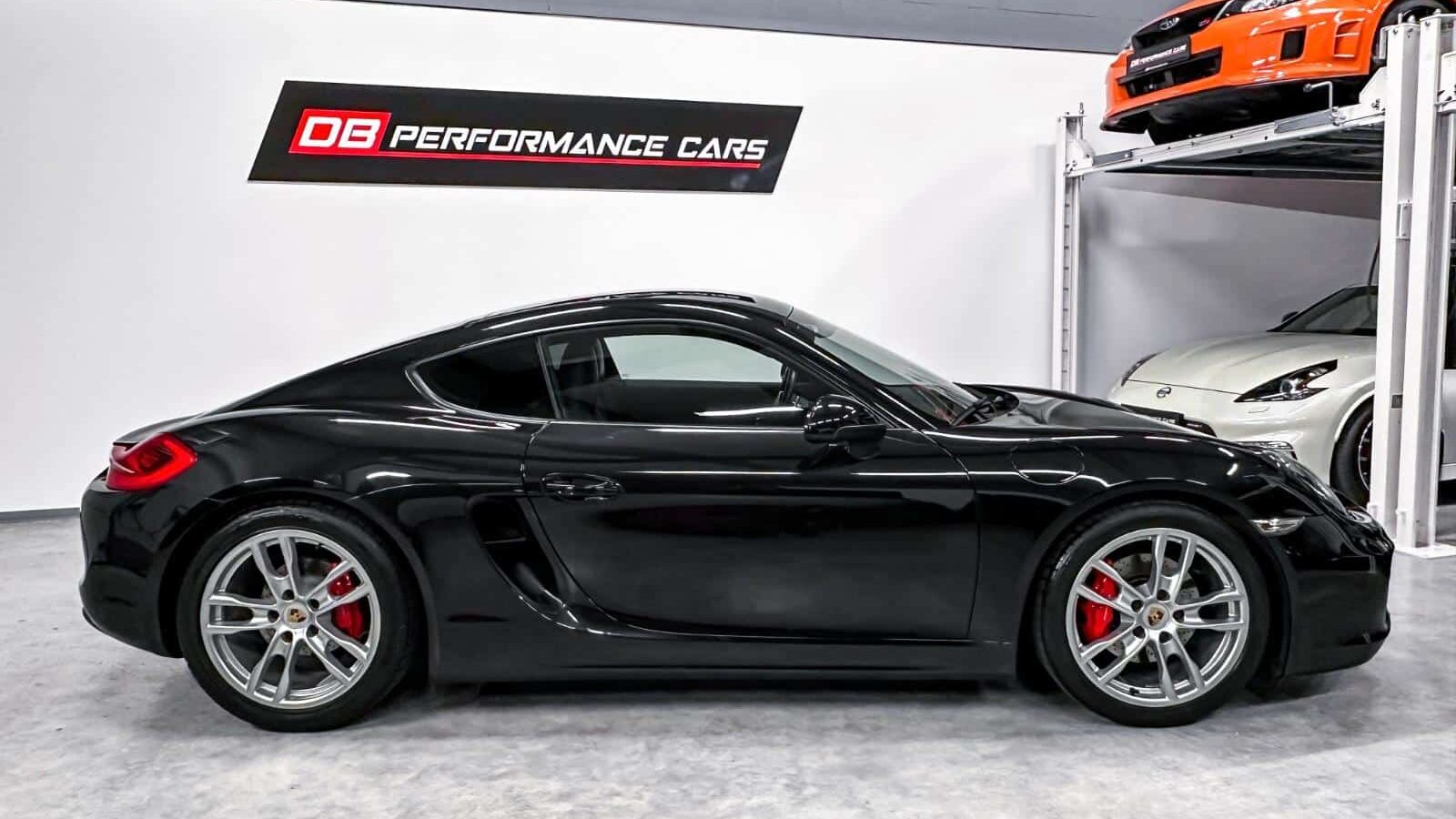 Porsche Cayman 981 S Noir Import Extérieur vue latérale jantes alliage silver